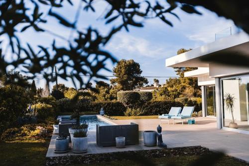 Κήπος έξω από το Villa luxe Ibiza Style, with heated pool