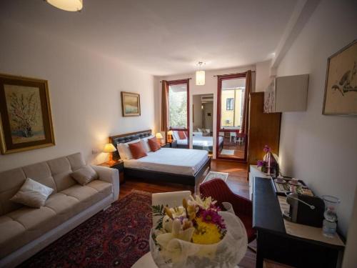 A bed or beds in a room at Ego' Residence Ferrara