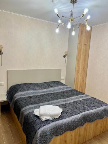 a bedroom with a large bed in a room at New Gudauri Redco F1 in Gudauri