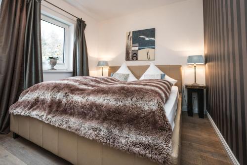 Ένα ή περισσότερα κρεβάτια σε δωμάτιο στο Boardinghouse Robbe