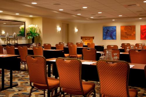 a large conference room with tables and chairs at San Francisco Marriott Fisherman's Wharf in San Francisco
