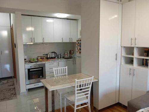 Køkken eller tekøkken på Maxima Apartment