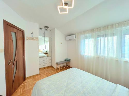 Ένα ή περισσότερα κρεβάτια σε δωμάτιο στο Centro apart