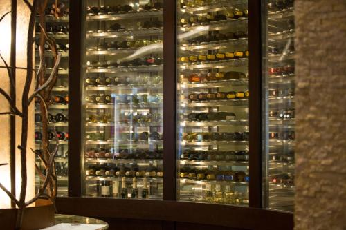 a refrigerator filled with lots of bottles of wine at Napa Valley Marriott Hotel & Spa in Napa
