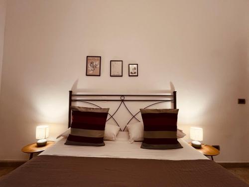 Łóżko lub łóżka w pokoju w obiekcie Sicilia Vacation rooms