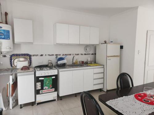 Η κουζίνα ή μικρή κουζίνα στο Duplex en Gualeguay