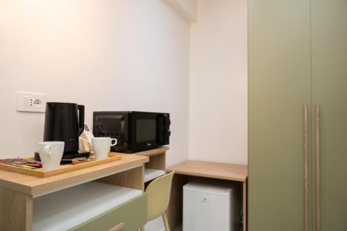 Kuchyň nebo kuchyňský kout v ubytování Napolitano Rooms - Pompei