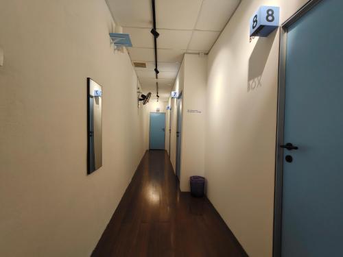 a corridor in an office building with a hallway at TREASURE BOX At Heritage Georgetown in George Town