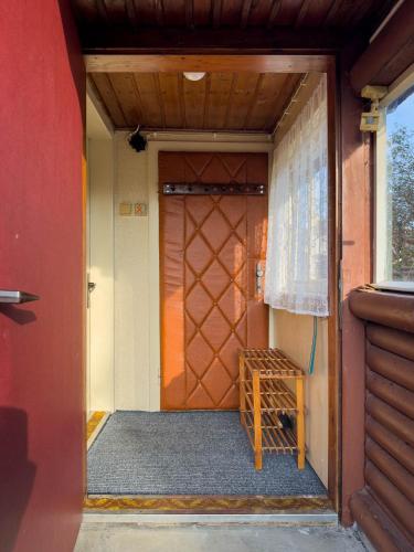 an open door of a house with a wooden door at Chaloupka Letohrad in Letohrad