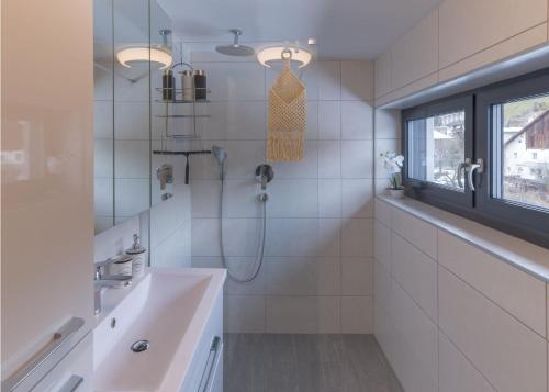 Ένα μπάνιο στο Ferienwohnung Ampass