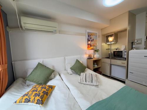 Shinjuku Yotsuya Sanchome Station 7-minute walk Hawaiian Twin Bed Charm Room 1R