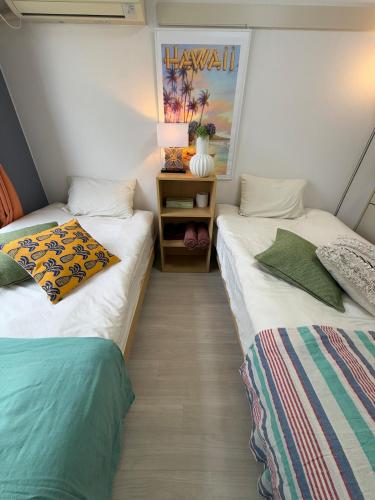 Shinjuku Yotsuya Sanchome Station 7-minute walk Hawaiian Twin Bed Charm Room 1R