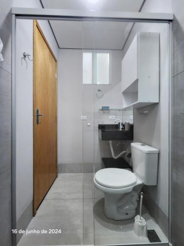 Ένα μπάνιο στο Residencial Yama - Hospedagens