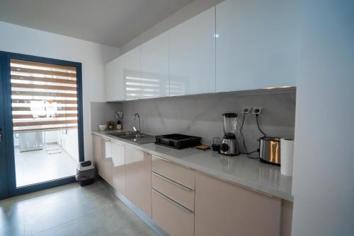 Una cocina o zona de cocina en Résidence Théa
