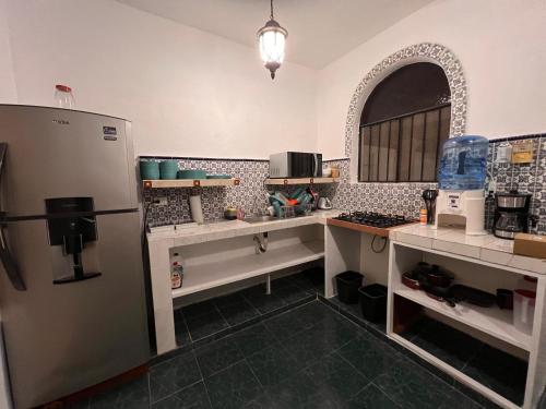 Кухня або міні-кухня у Hostal Patio Nómada