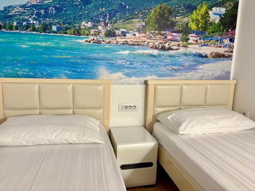 Ένα ή περισσότερα κρεβάτια σε δωμάτιο στο Bel Mare Apartment 1