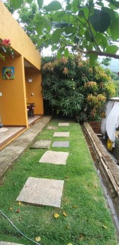 Taman di luar Espaço Villa Pella - Chalé Cravo