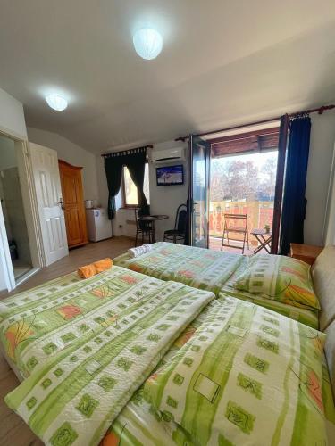 Una cama o camas en una habitación de Villa Eko