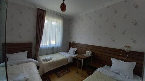Postel nebo postele na pokoji v ubytování MOUNTAIN HEART