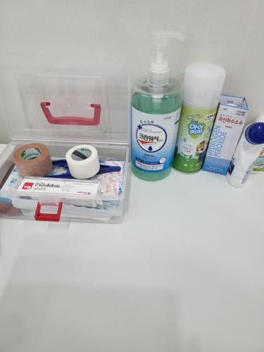 a shelf with medicines and other items in a refrigerator at Wonju Aunt Home in Wonju