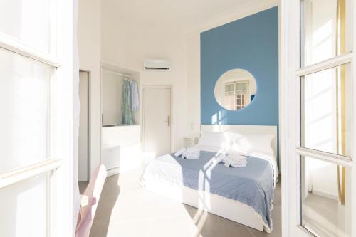 Ένα ή περισσότερα κρεβάτια σε δωμάτιο στο Maddalena Rooms - Eja Sardinia