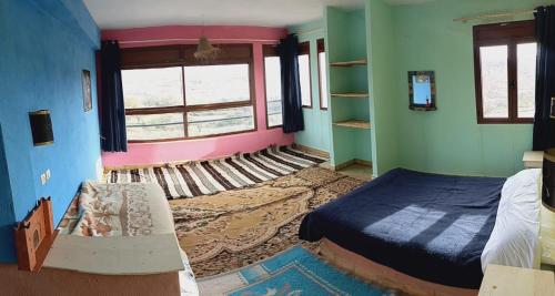 Ένα ή περισσότερα κρεβάτια σε δωμάτιο στο Auberge Assays