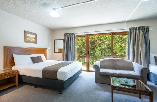 Postel nebo postele na pokoji v ubytování Admirals Motor Inn