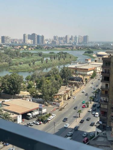 a view of a city with a river and buildings at إشراقة النيل in Cairo