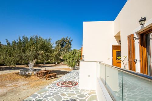 a view from the balcony of a house at Olive Studios Karpathos Studio #1 in Karpathos Town