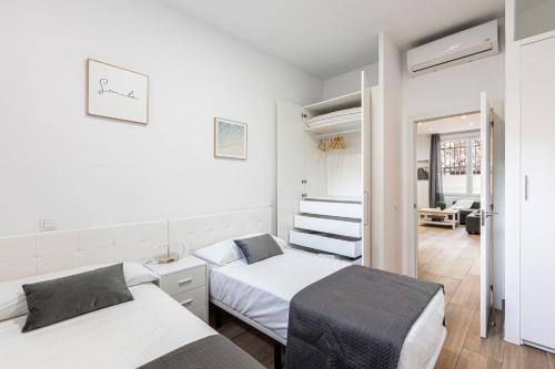 เตียงในห้องที่ Apartamento a 5 minutos del centro de Madrid 6P