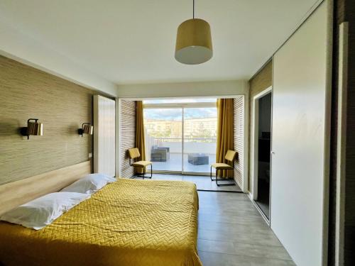 Postel nebo postele na pokoji v ubytování Hôtel Le Littoral - Berck sur Mer