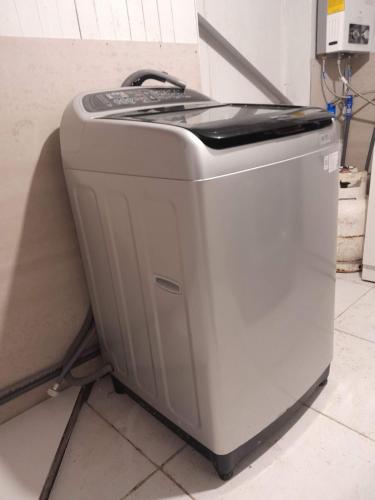 a toaster sitting on a floor next to a wall at Hospedaje Familiar Puerto Montt Centro in Puerto Montt