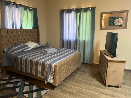 Llit o llits en una habitació de Hostal Bless house