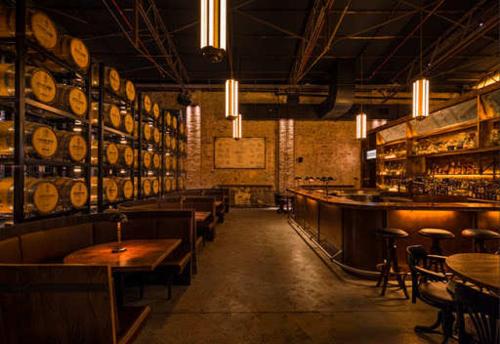 a room with a bar and tables and wine barrels at Double Room in Kingsford - Next to the Station - Shared Bathroom in Sydney