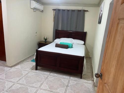 Llit o llits en una habitació de Hostal Bless house