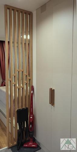 a room with a red appliance on a wall at Pinewood ANG luxurious apartment A43, Borovets Gardens in Borovets