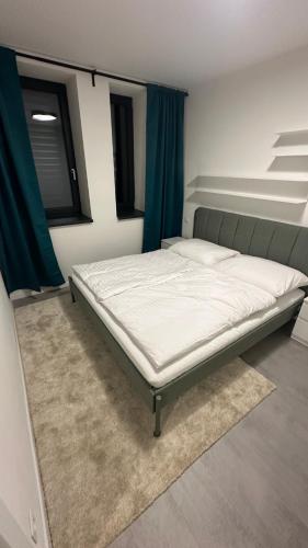 Ένα ή περισσότερα κρεβάτια σε δωμάτιο στο Apartmány pod Chočom