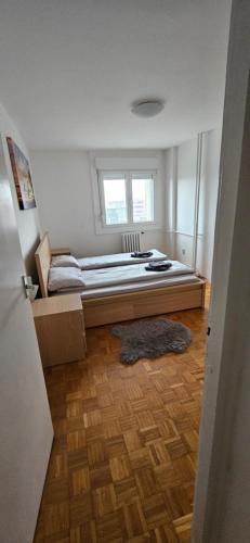 Ένα ή περισσότερα κρεβάτια σε δωμάτιο στο 3-rooms Arena apartment