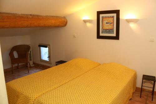 Cama o camas de una habitación en Le Mas des Sagnes