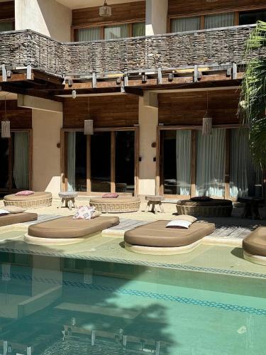 Kolam renang di atau dekat dengan CervecerIa Tulum Boutique Hotel & Beer Spa
