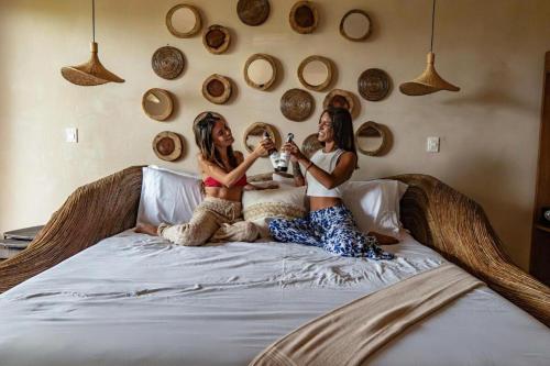 Katil atau katil-katil dalam bilik di CervecerIa Tulum Boutique Hotel & Beer Spa