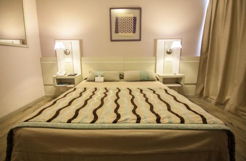 Hotel Continentalにあるベッド