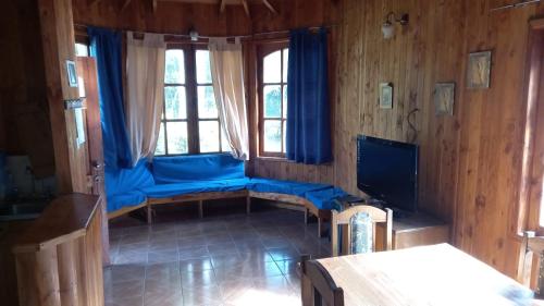 Ένα ή περισσότερα κρεβάτια σε δωμάτιο στο Cabañas Rucatregua