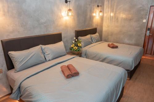 Ένα ή περισσότερα κρεβάτια σε δωμάτιο στο Bricks Guesthouse