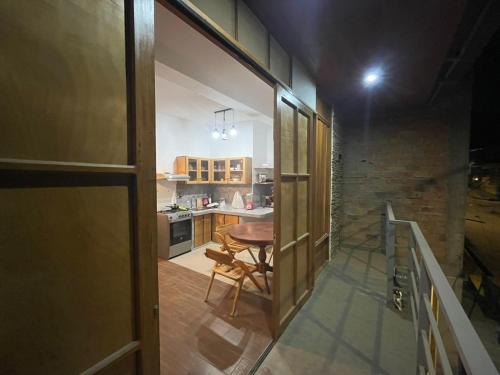 Η κουζίνα ή μικρή κουζίνα στο Casa Elhi 4