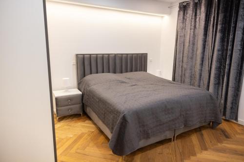 Ένα ή περισσότερα κρεβάτια σε δωμάτιο στο Stylisches Premium Apartment am Hellweg mit Komfort und WLAN inklusive