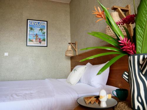 Postel nebo postele na pokoji v ubytování Coast 67 Boutique Hotel