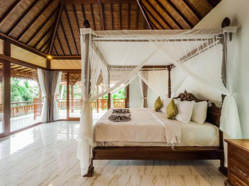 Kubu Manah Ubudにあるベッド