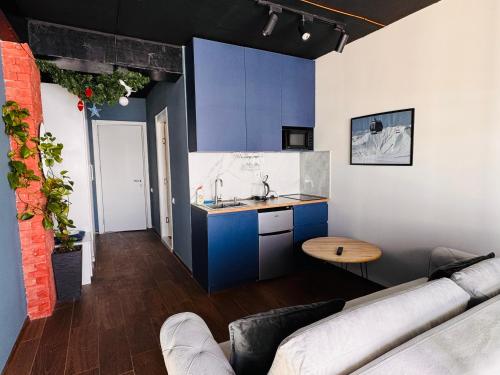 Kuchyň nebo kuchyňský kout v ubytování Twins apartment deluxe, new gudauri