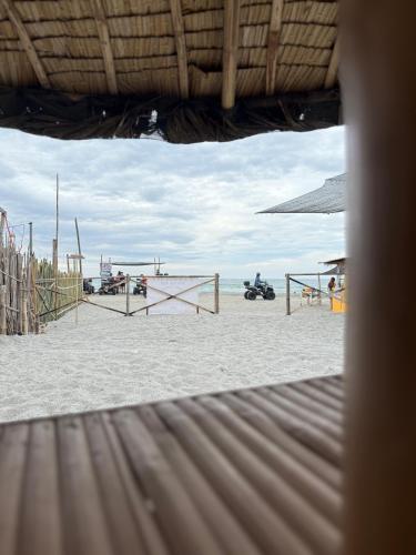 a view of a volley ball net on a beach at Sand Castles Beachfront Resort in Zambales